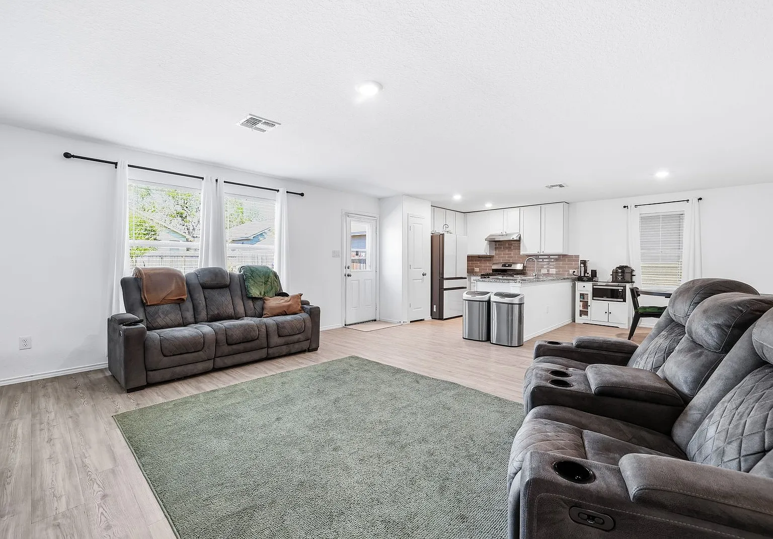 Open Concept Home with Loft & Two Patios — Photo 2
