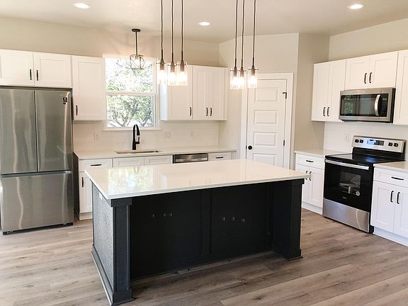Quartz counter tops throughout the kitchen and all bathrooms.