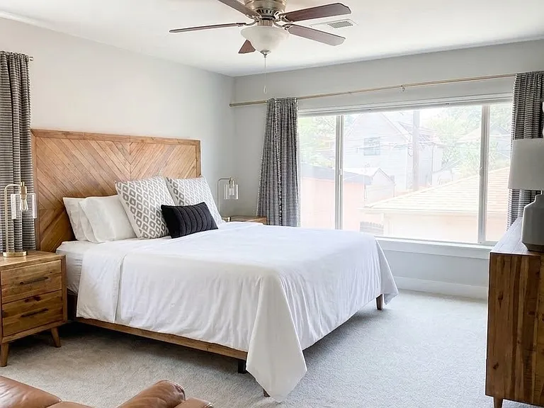 Master bedroom with a split king Saatva organic mattress with the option for adjustable heights.