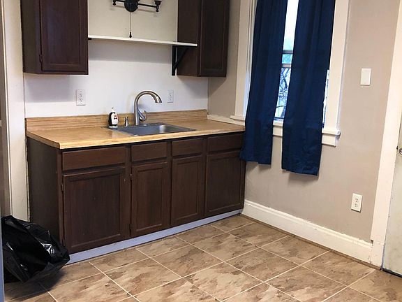 Kitchen....there are more cabinets along the left wall.