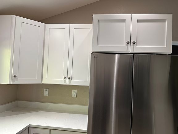 24" deep storage over the large LG Fridge.