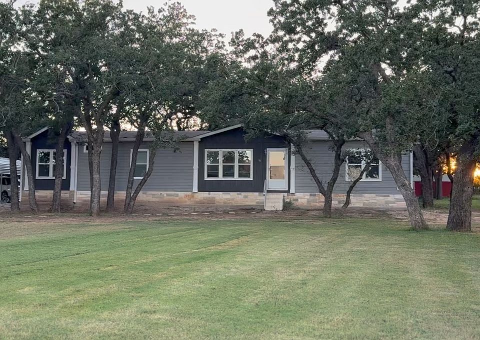 Front yard, front deck is currently being built.