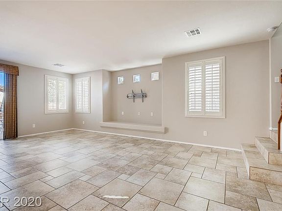 3rd image of 9846 W Tompkins Ave