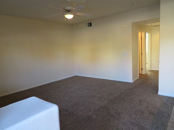View of living room as you enter the front door.