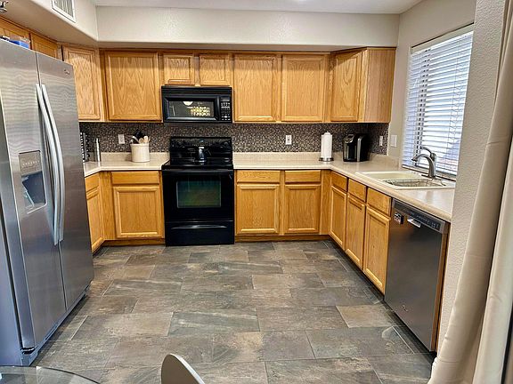 Fully stocked kitchen including cookware and small appliances