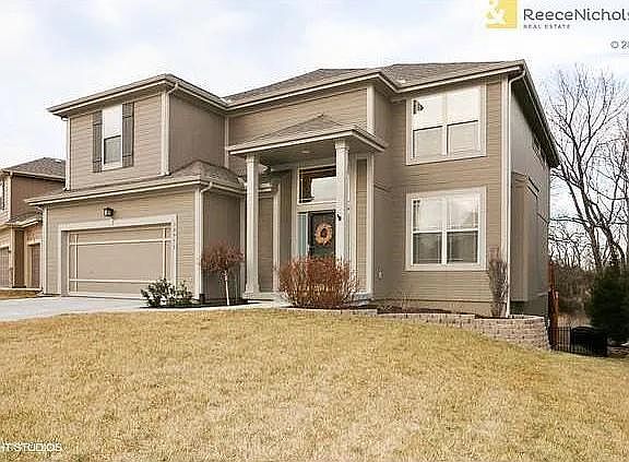 Spacious 2 story, with fabulous finished walkout basement. Kitchen has walk-in pantry, wood floors, Stainless steel appl., & granite counters. Master bath has walk-in shower with two heads, separate tub, double vanity , tile floors & walk-in closet. I