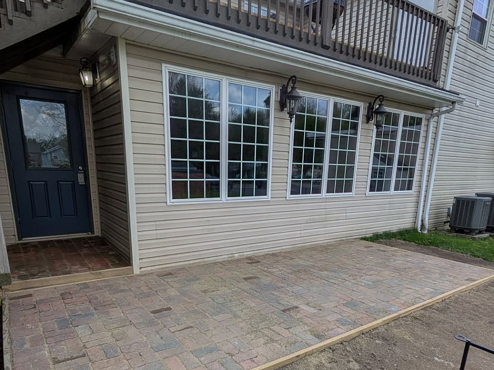 Back Entranceway with 8 ft x 20 ft Backyard Brick Patio.