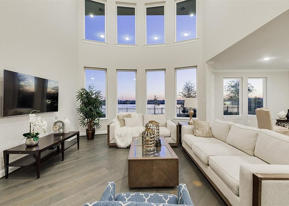 Welcome to your own paradise on the water in the popular Imperial neighborhood next to Constellation Field! The home is the popular Van Gogh plan and includes most all of the upgrades put in the model home and was just built in 2017. It's lightly liv