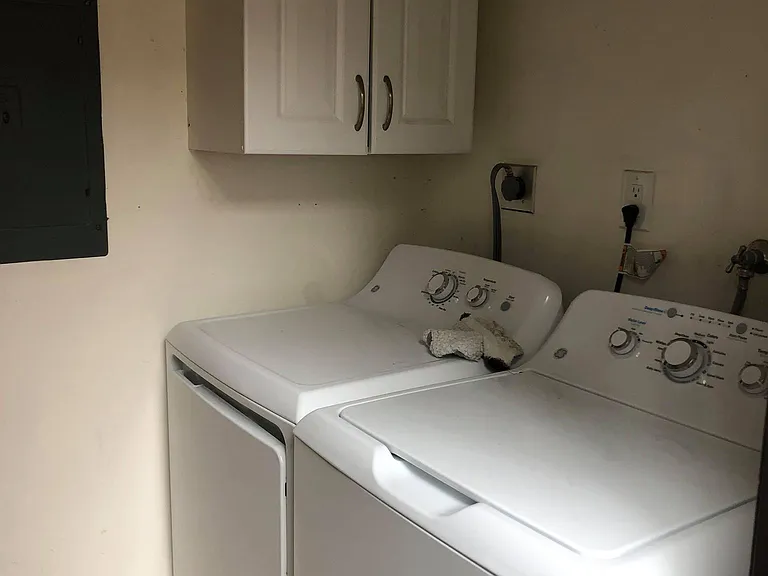 Washer dryer in laundry room