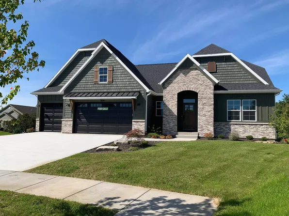 7814 Woodhurst Dr NE, Rockford, MI 49341