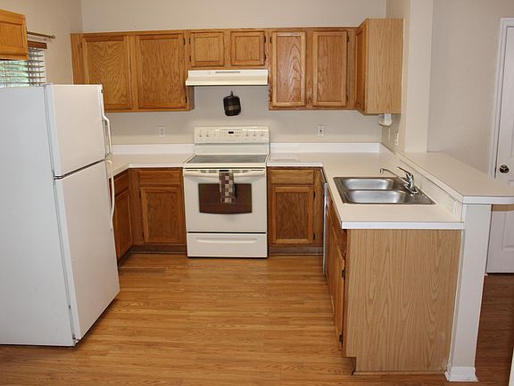 Kitchen includes refrigerator/freezer (no ice maker), glass cook top range, dishwasher and double stainless steel sink. Plenty of cabinets and drawers.