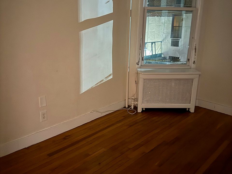2nd bedroom, left side large room, wood floors, 2 windows with good light, closet