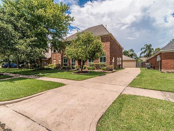 This nice long driveway will accommodate your family and guests.