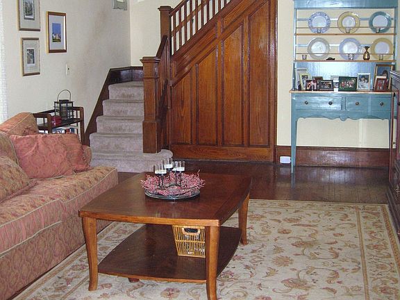 living room with raised panel chestnut detail