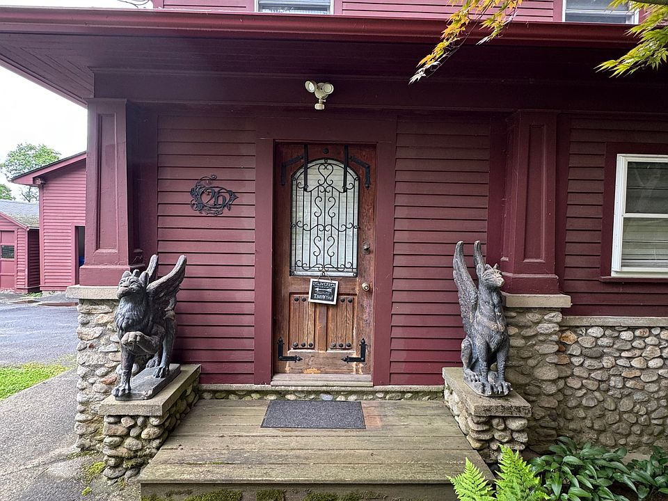 Beyond this door lies adventure untold_guarded by a watchful guards who know all but says nothing.