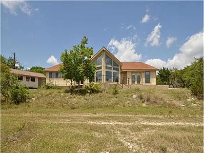 With over 3200 SF, 5+ acres, 4 BR/3.5 BA, a workshop/music studi