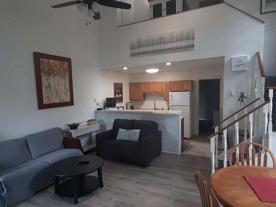 Living Room from fireplace view. (new sofa loveseat in charcoal color)