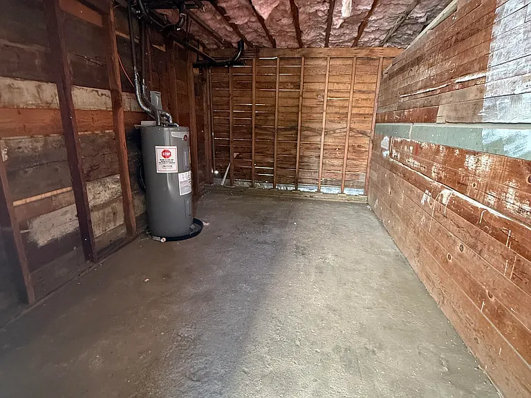 10' x 16' Storage Unit, with newer water heater to your unit and partially finished W/D hookups. 
Not a garage for parking.