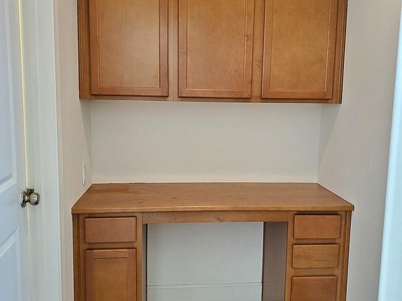 Desk next to Kitchen (with power outlet)