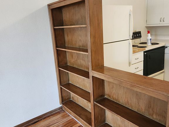 Divider Book Case Between Living Room and Kitchen