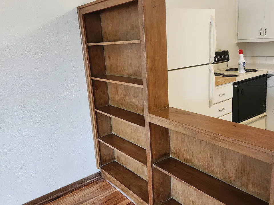 Divider Book Case Between Living Room and Kitchen
