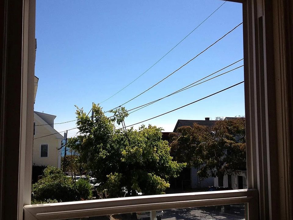 Lots of sky even from this 1st floor apartment. Even an ocean glimpse there.