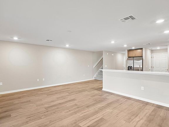 Enjoy a bright and open living area - Daisy townhome by Highland Homes