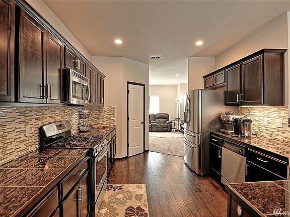 Open Chef's Kitchen which includes SS appliances plus a breakfast nook 