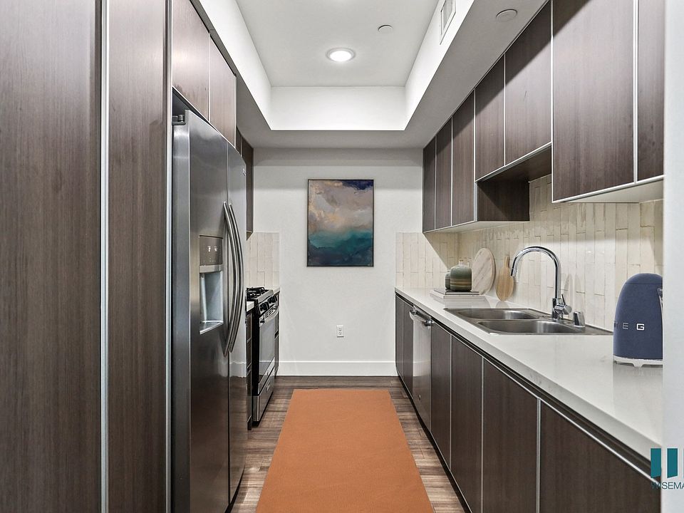 Kitchen with Energy-Efficient Appliances and Ample Cabinet Storage