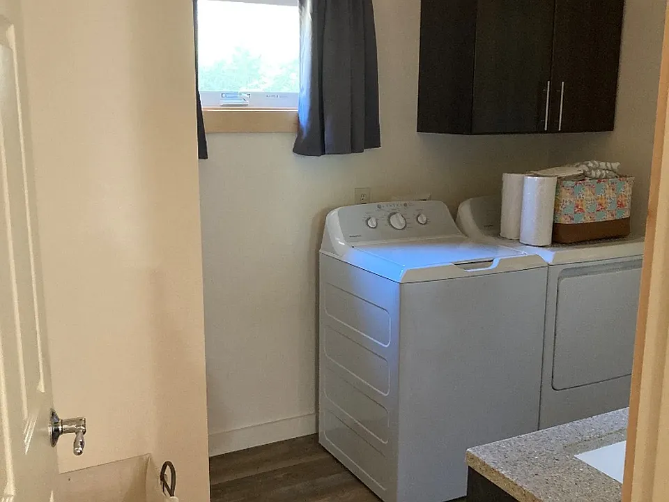 Bathroom with washer and dryer