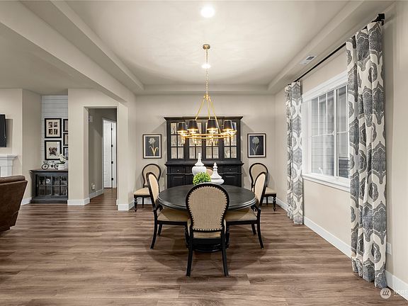 10ft ceilings, 6-panel 8ft interior doors, custom millwork package.>