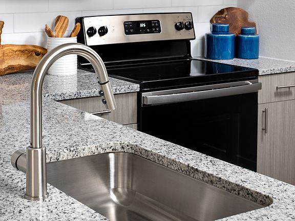 Granite countertops in kitchens and bathrooms