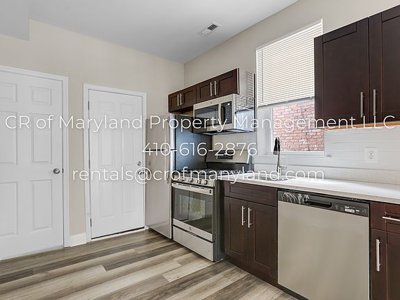 LOGO_2215_Riggs_Avenue_010_08122022