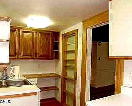 Kitchen with oak cabinets