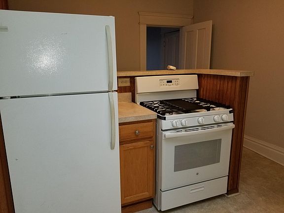 Kitchen with new gas range.