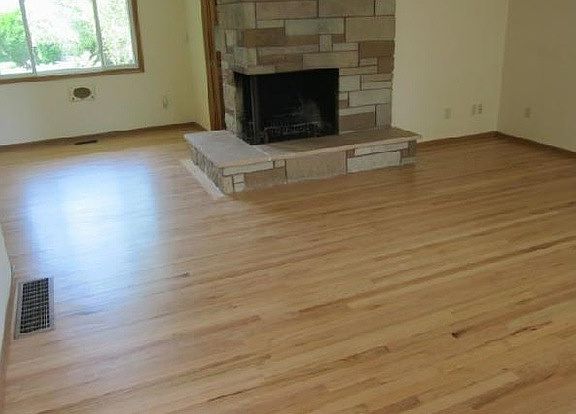 Living/Dining room with stone fireplace