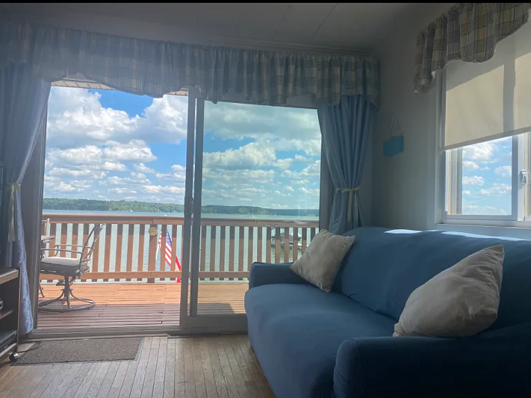 View the lake from the two sofas in the livingroom