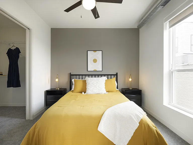 Walk in closet, warm accent walls and modern fixtures await!