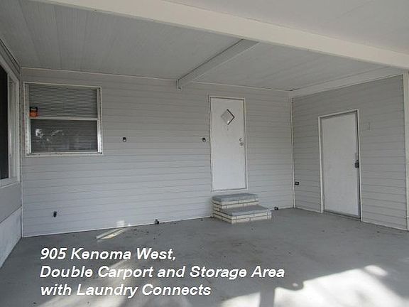 carport area and storage has a full laundry set