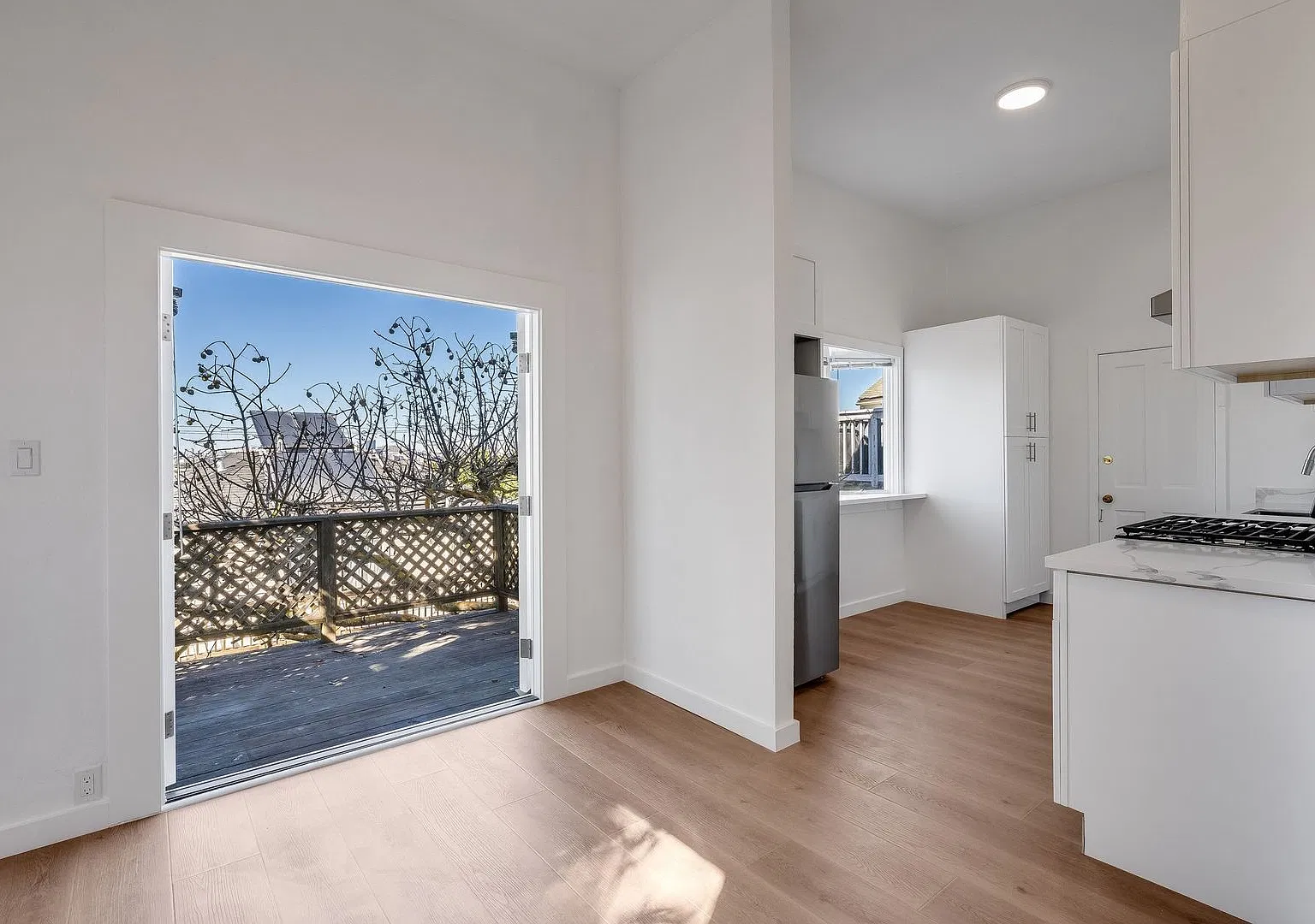 Newly remodeled 1BR with laundry, garage, deck with views — Photo 1