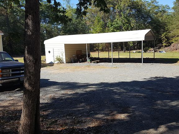 3 bay carport with storage