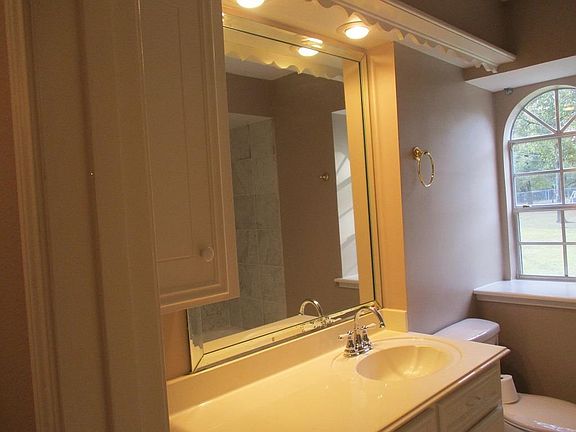 2nd Bathroom. Note full size mirror w/ beveled edge and new fixtures.