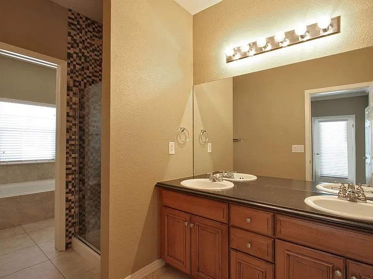 MASTER BATH UPPER LEVEL 
NEWLY PAINTED WITH A LIGHTER COLOR (NOT SHOWN)
