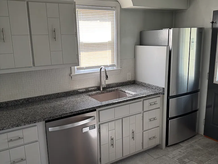 Kitchen updates- Granite countertops, sink and faucet have been replaced since other photos were taken