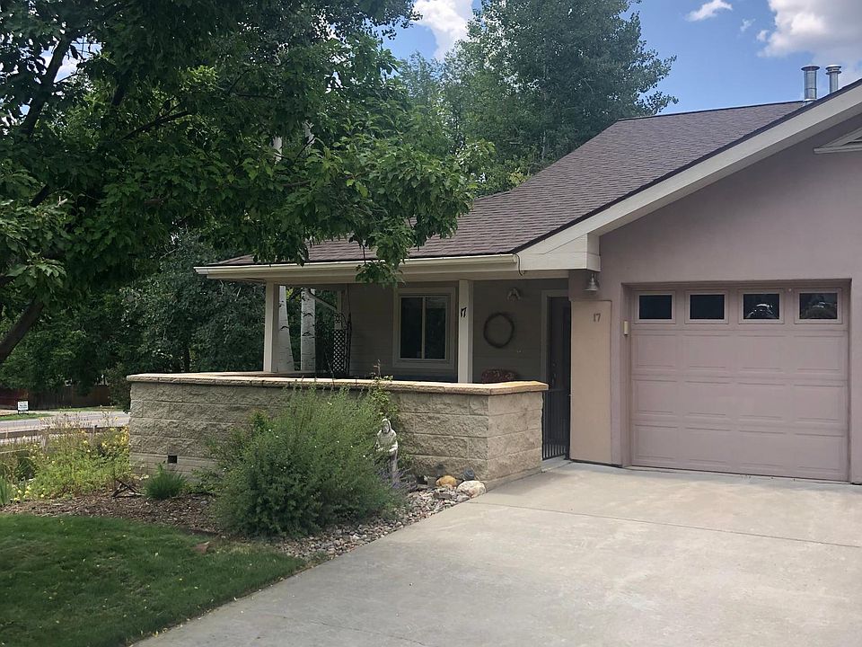 Corner townhouse with landscaping, where deer often come to visit. Front patio. One car garage and driveway parking. Drive is plowed in winter by HOA.