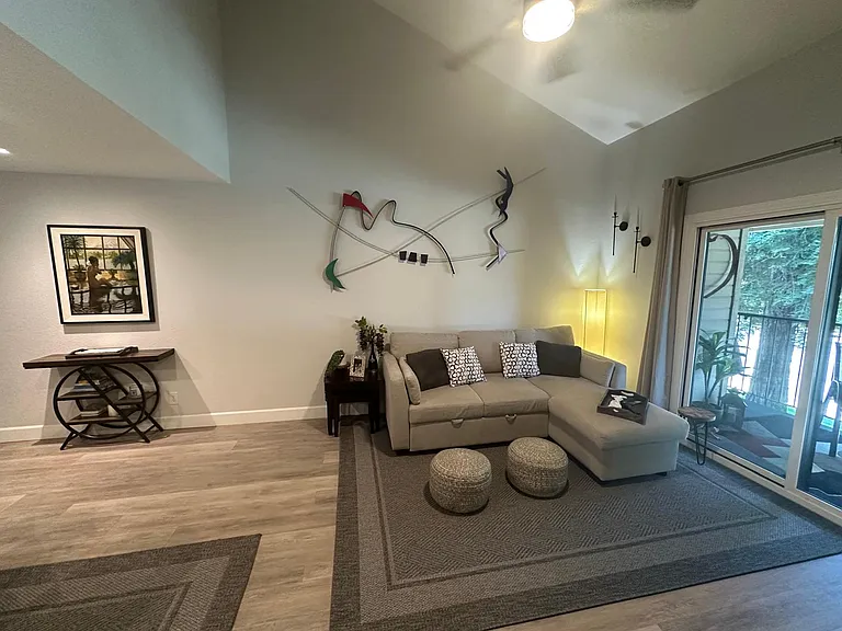 Living area - high ceilings, remote controlled fan and light