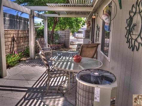 Inviting sun shaded patio with aluma-wood roof
