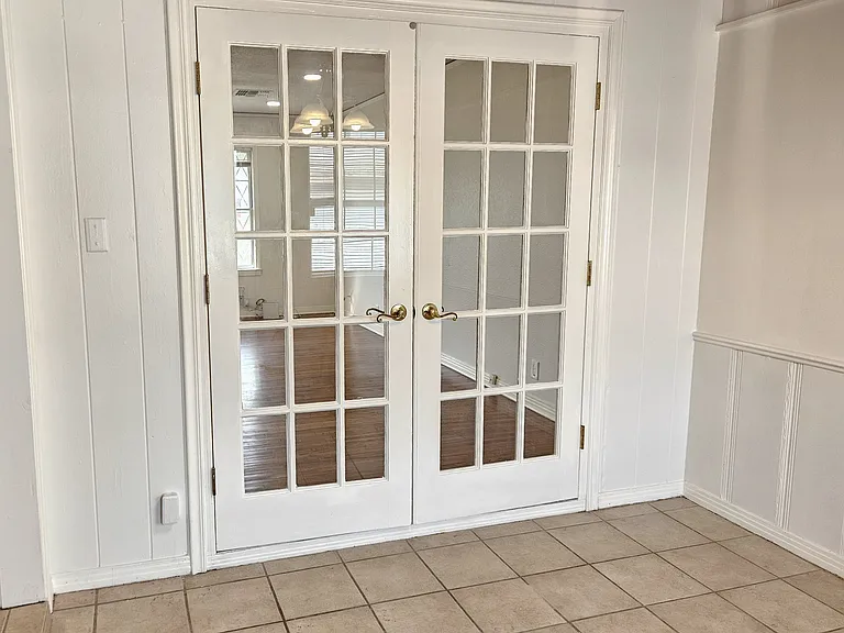 Cute dinette doors, leading into living room