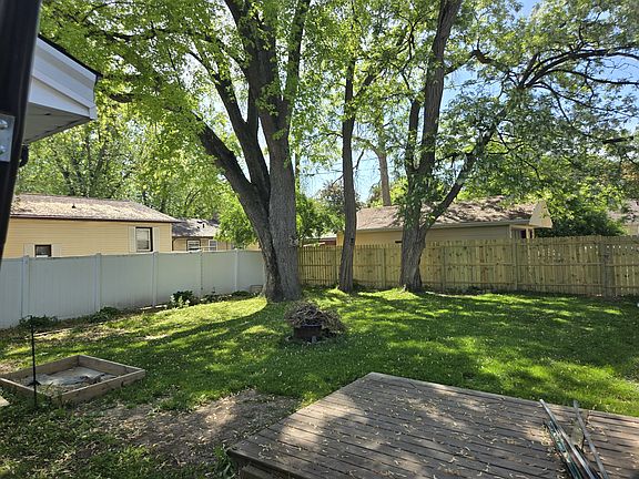 back yard partially fenced but can be all done with some lattice.