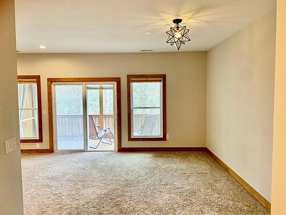 downstairs living and dining area w/view out to patio